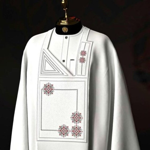 Elegance in White: Embroidered Agbada Masterpiece