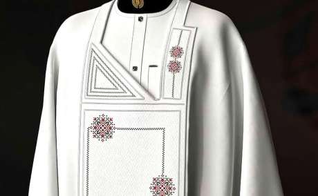 Elegance in White: Embroidered Agbada Masterpiece